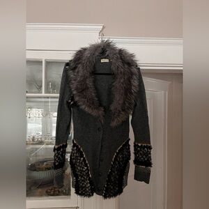 Anthropologie sweater with removable fur collar. Has fringe and it’s very warm.